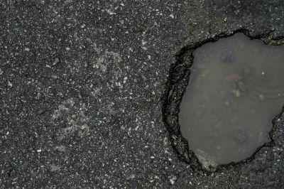 Repair Potholes in the Parking Lot!